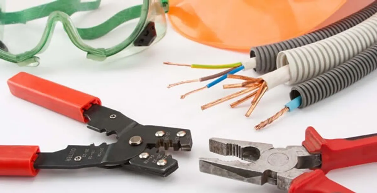 Electrical wiring repair with professional tools and safety equipment in Belmont, MI