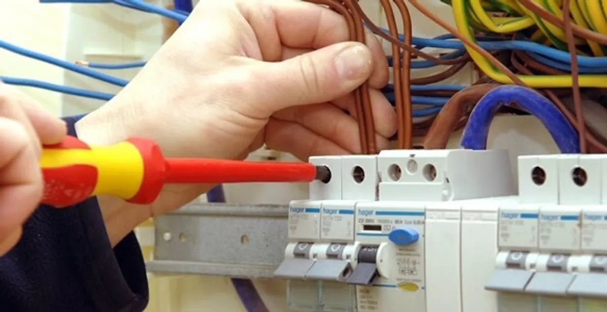 electrician services performing professional electrical panel wiring and connections in Grand Rapids, MI