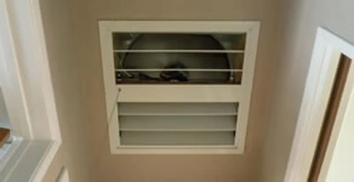whole house fan installation services with ceiling-mounted ventilation system in Grand Rapids, MI